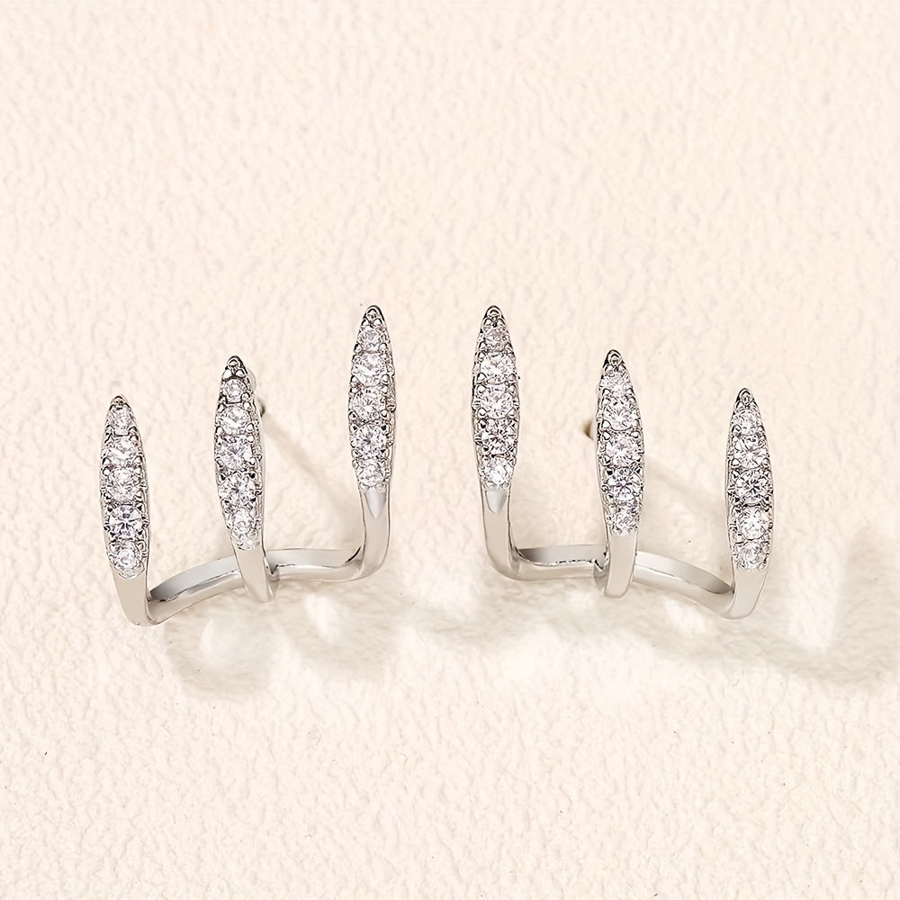 Boucles d'Oreilles Élégantes avec Trois Griffes et Strass