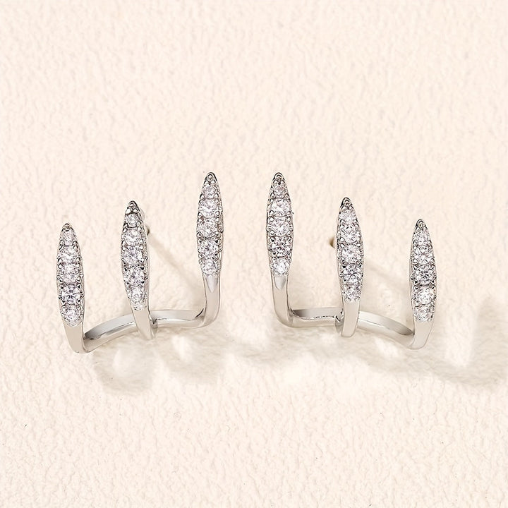 Boucles d'Oreilles Élégantes avec Trois Griffes et Strass
