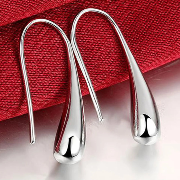 Boucles d'oreilles créoles avec goutte d'eau en argent