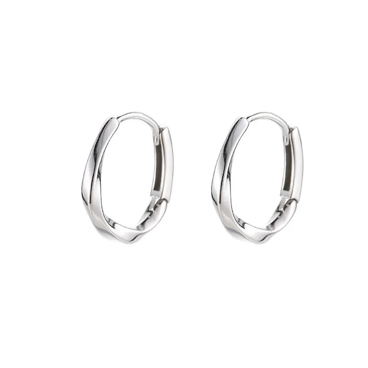 Boucles d'Oreilles Rondes Encrustées en Argent