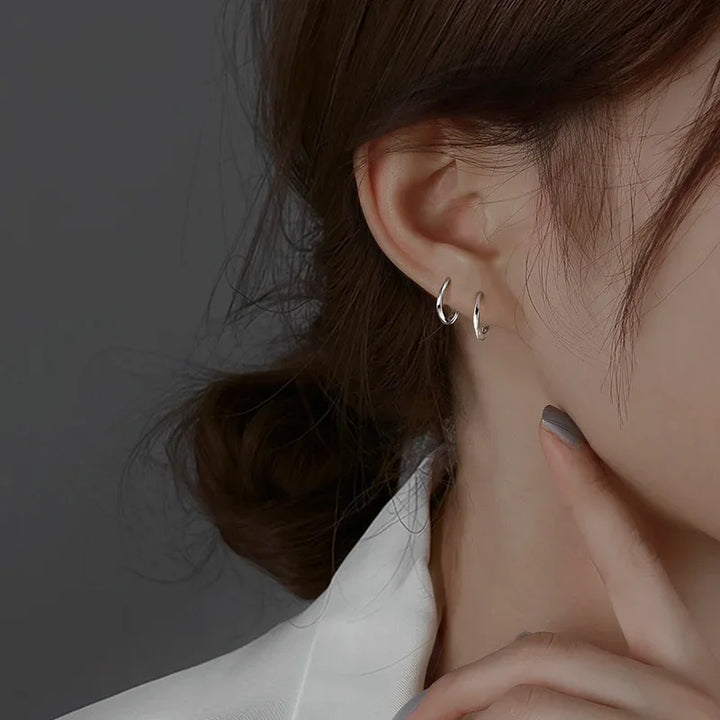 Boucles d'Oreilles Rondes Encrustées en Argent