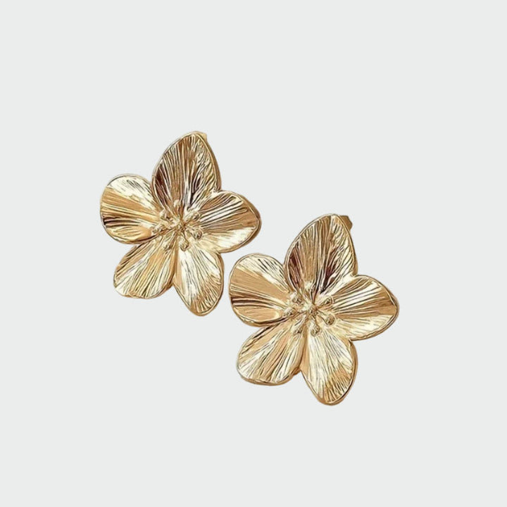BOUCLES D'OREILLES FLORALES AVEC UN REVÊTEMENT EN OR