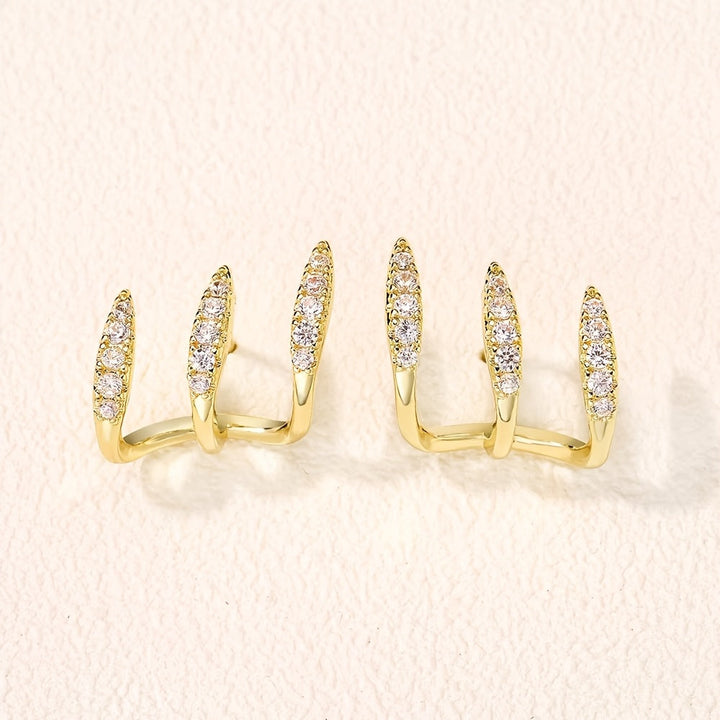 Boucles d'Oreilles Élégantes avec Trois Griffes et Strass