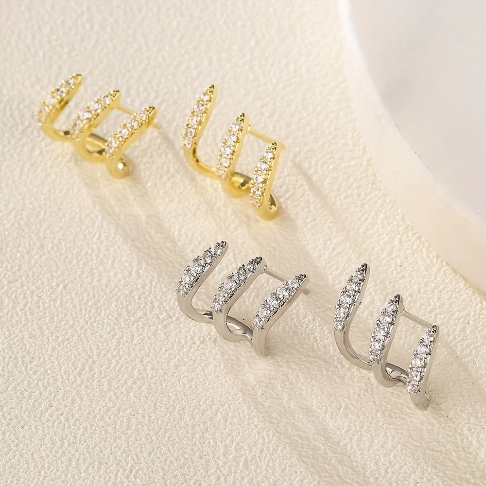 Boucles d'Oreilles Élégantes avec Trois Griffes et Strass