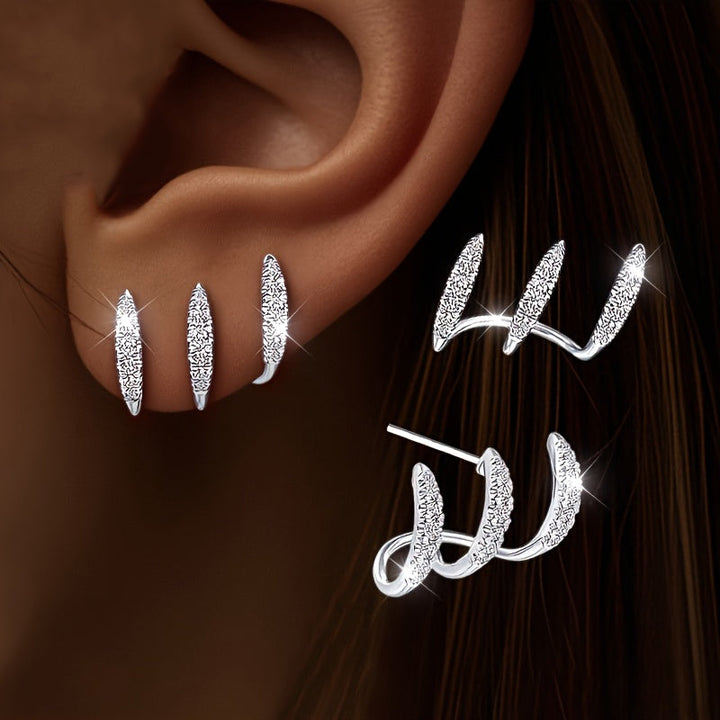 Boucles d'Oreilles Élégantes avec Trois Griffes et Strass