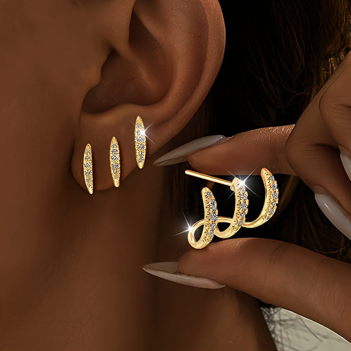 Boucles d'Oreilles Élégantes avec Trois Griffes et Strass